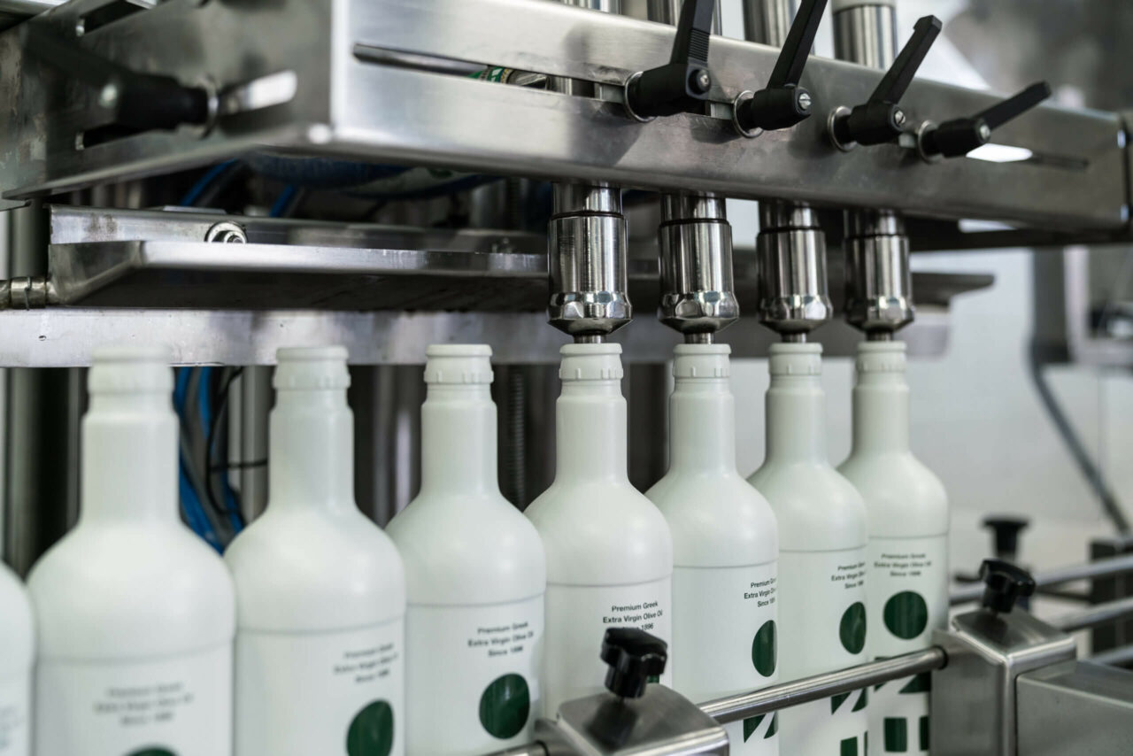 Filling bottles with olive oil
